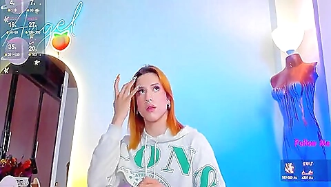 Red-haired blonde in stockings masturbates with a dildo