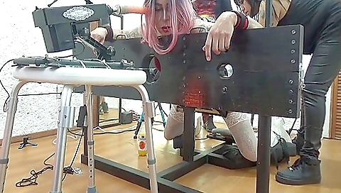 Amateur bondage with a tight dildo gagging on a big one